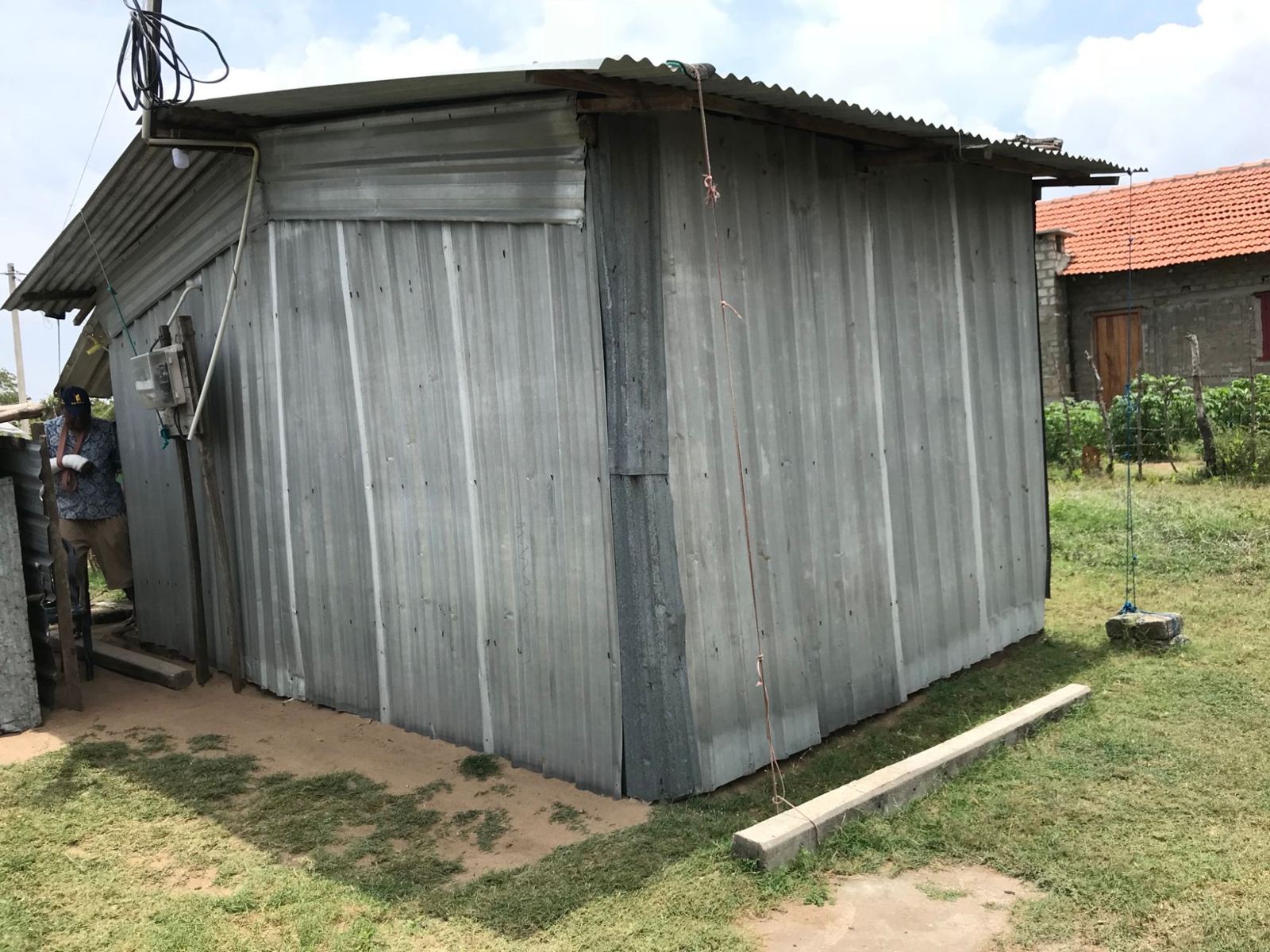 A corrugated iron hut where a family lives, in Sri Lanka